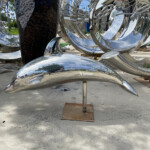 silver dolphin statue