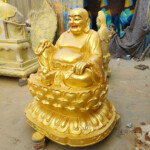 laughing gold buddha statue