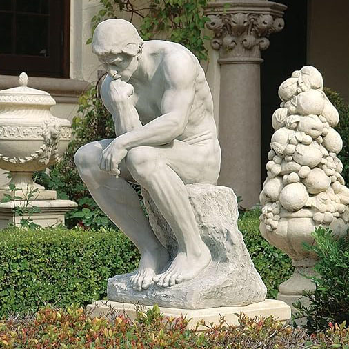 man sitting thinking statue