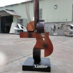 arman violin sculpture