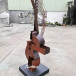 arman violin sculpture