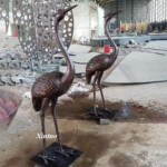 bronze cranes garden statues